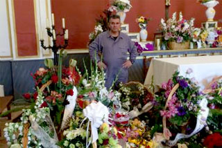 Este ao las flores de la ofrenda a Santa Eulalia se llevaron a la capilla del cementerio para todos los difuntos